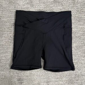 Fabletics Black High-Rise Crossover Waist Bike Shorts